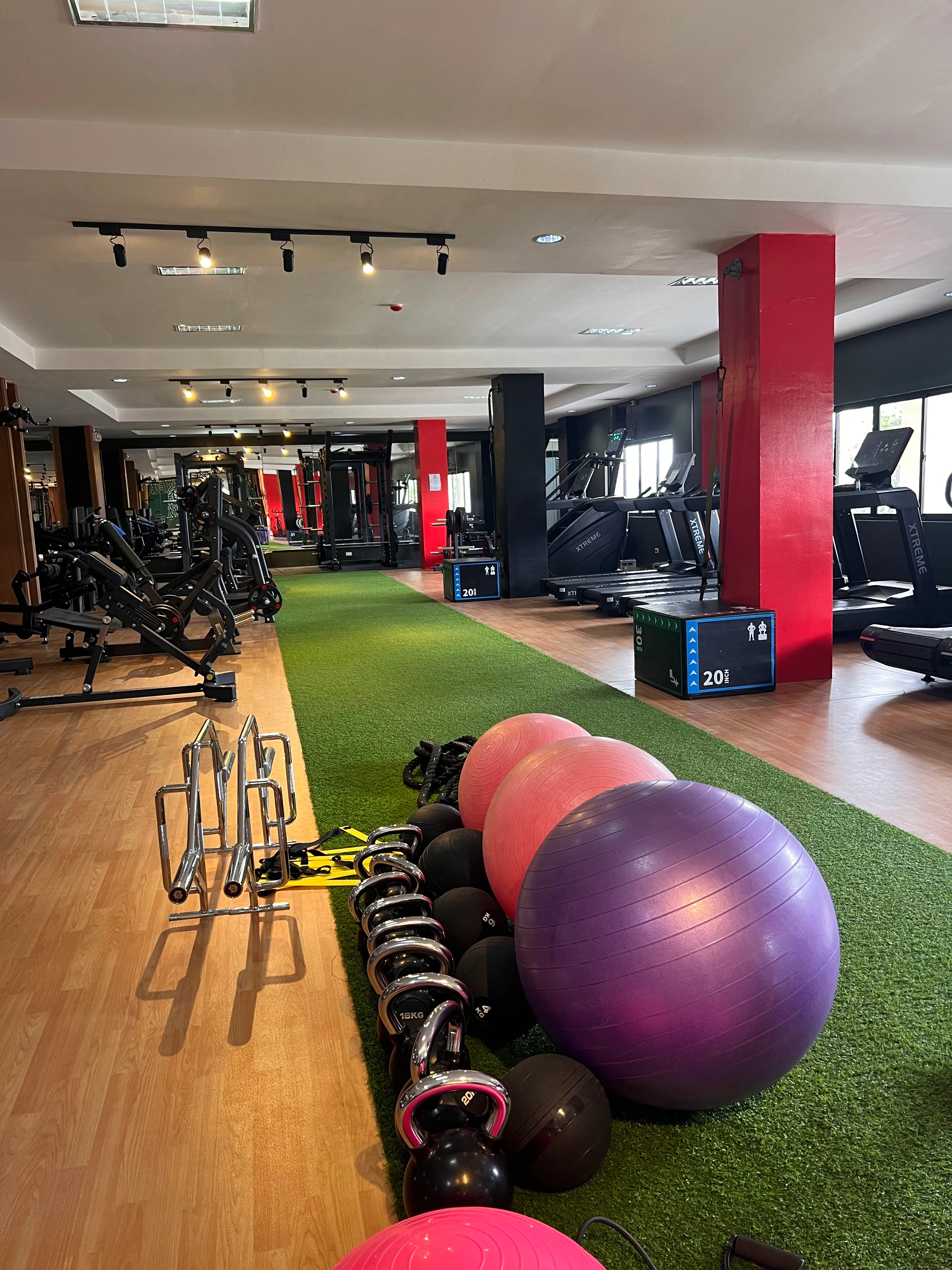 Functional turf lane with kettlebells and stability balls